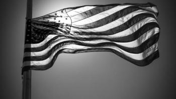 Black and white photo of an American flag.