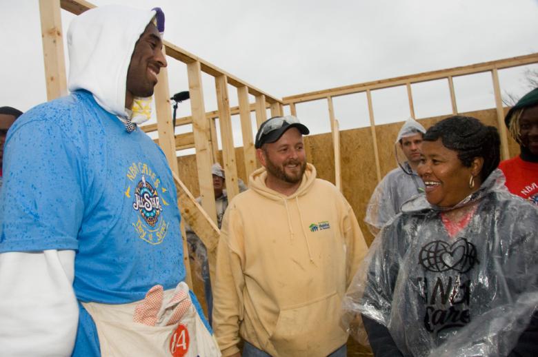 Scott Pointer, Kobe Bryant, and future homeowner on Build-a-Thon build site